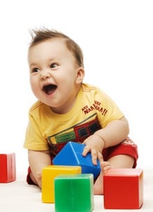 Baby playing with blocks